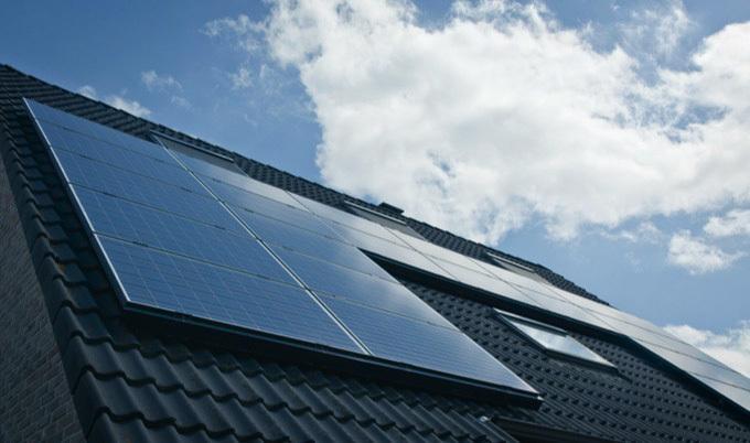 House with solar panels on the roof.