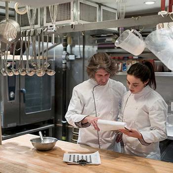 two chefs in kitchen