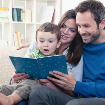 parents reading to  child