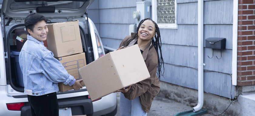 outside moving boxes into house