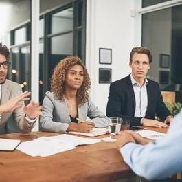 employees interviewing candidate