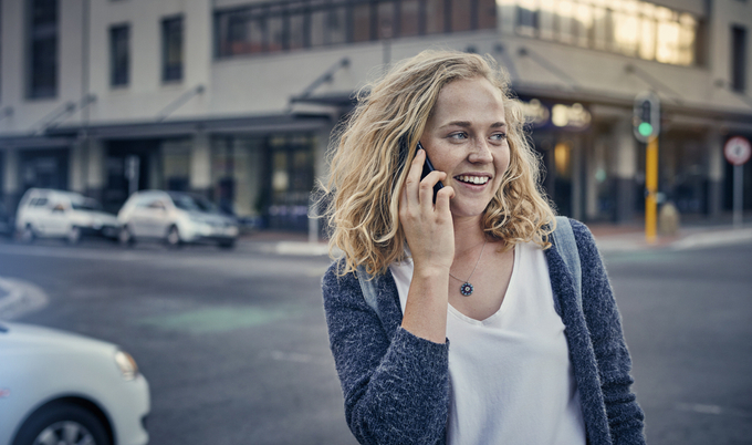 Young woman talking on her smart phone