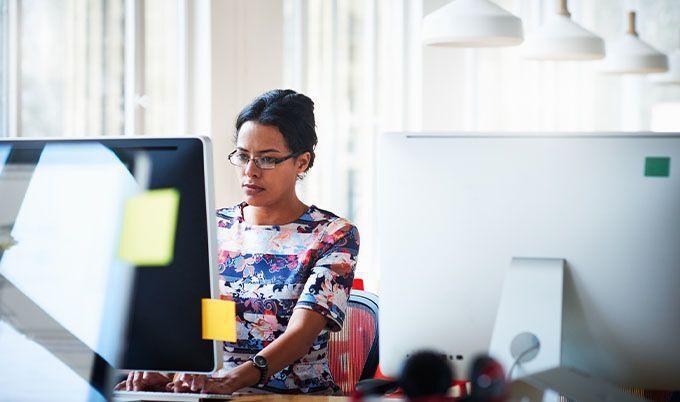 woman sitting at office desk