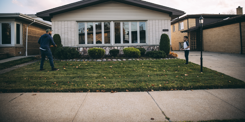 Father and son playing frisbee