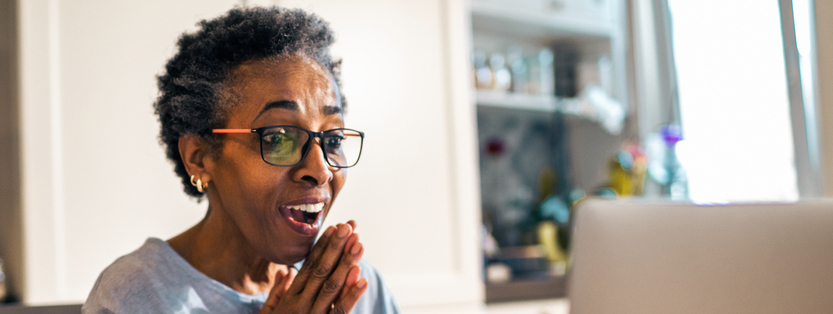 Close up of a senior woman using a laptop
