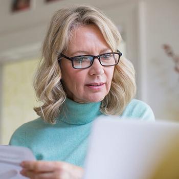 Woman looking at paperwork