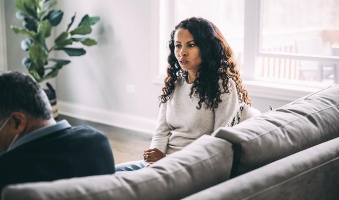 Woman sitting on couch