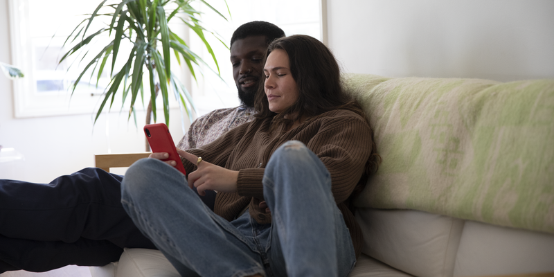 couple looking at phone