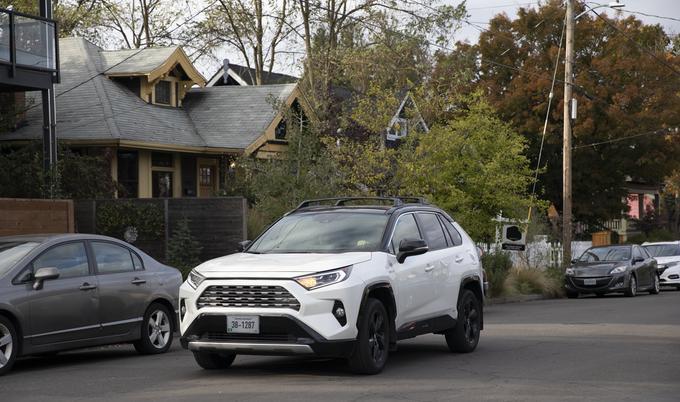 Car driving through city