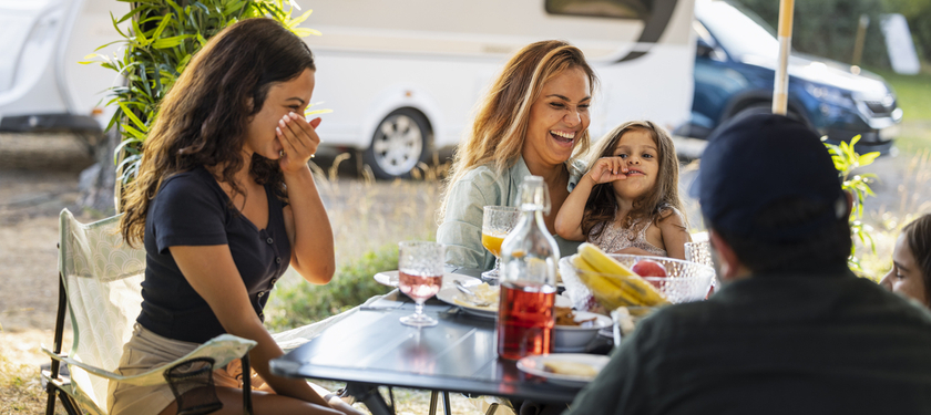 Family having meal at camping 