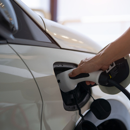 Plugged in, charging an electric car
