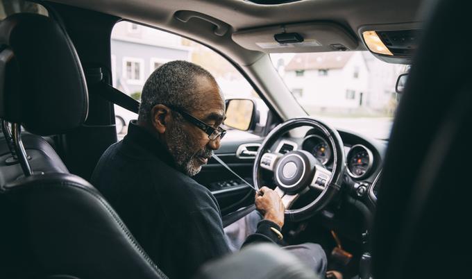 father and son in car