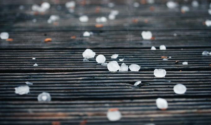 Hailstones on plank.