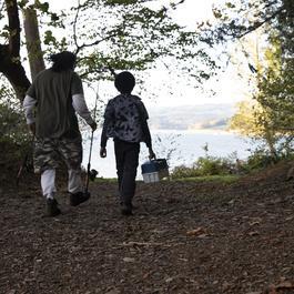 man and kid going fishing