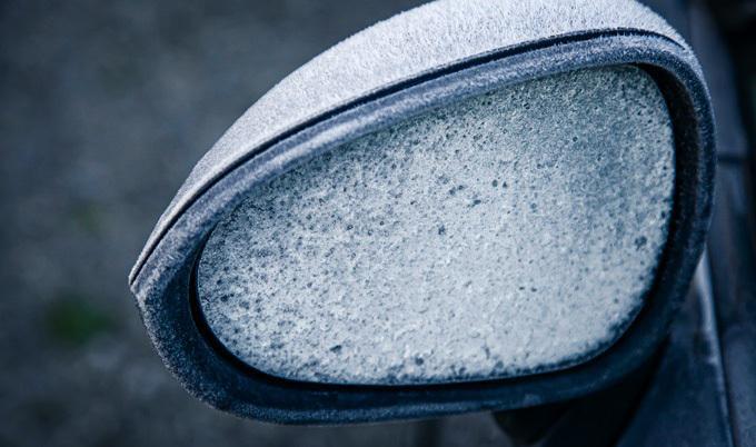 Frost on a car side mirror.