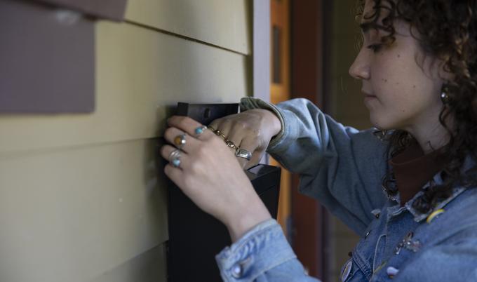  brunette woman checking mail