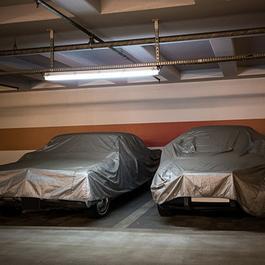 two cars under cover