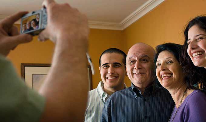 Family photo being taken in home
