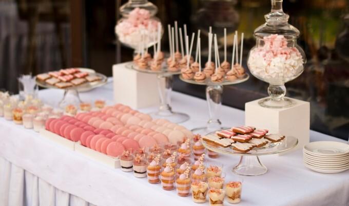 Sweets assorted on a white table.