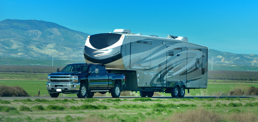 Pick up vehicle with a large trailer