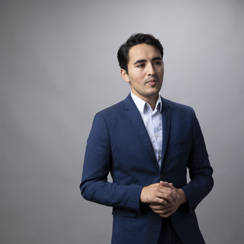 young hispanic man business casual portrait.