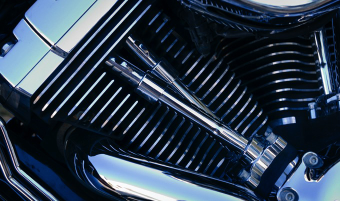 Chromed motorbike engine close up.