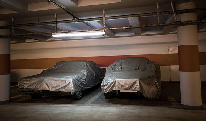 two cars under cover
