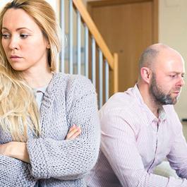 woman facing away from man