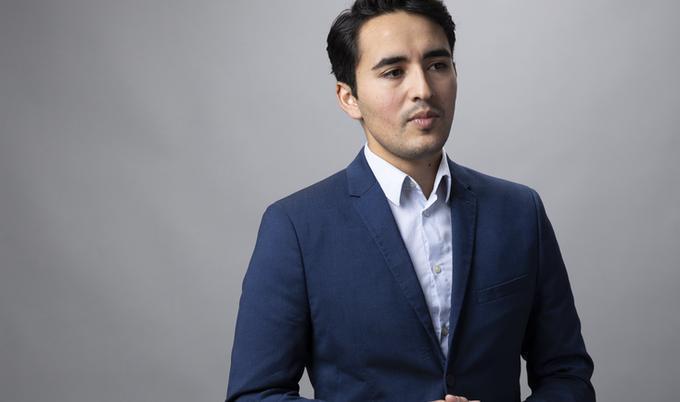 young hispanic man business casual portrait