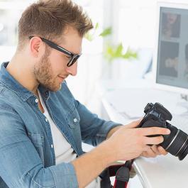 male photographer looking at camera