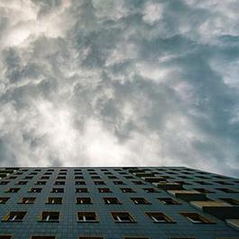 storm clouds over apartment building