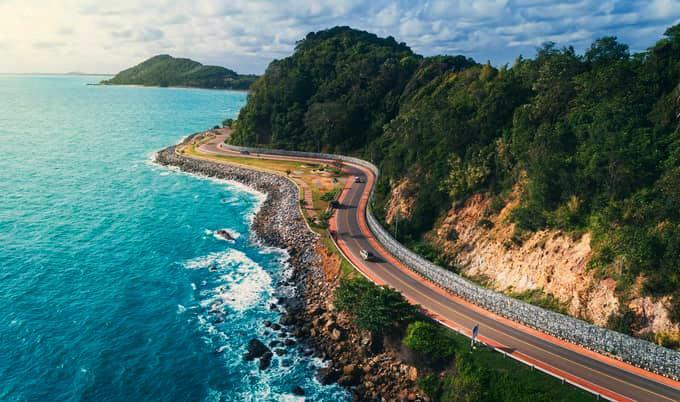 Aerial view highway road along the sea.
