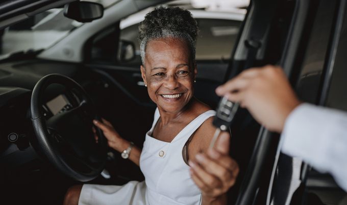 Car theft - thief trying to break into the vehicle.