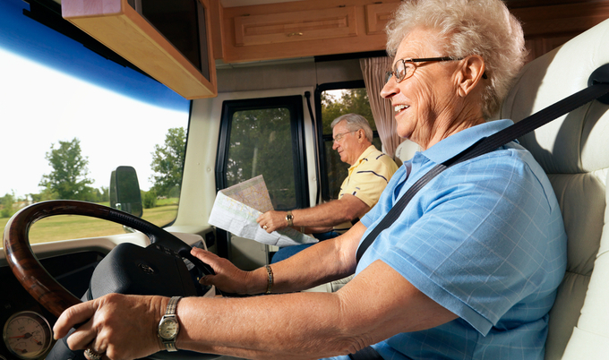 Senior couple enjoying a road trip in their RV.