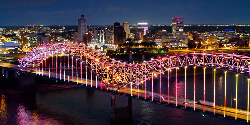 Aerial shot of the spectacular light show on the Hernando de Soto Bridge, which carries Interstate 40 across the Mississippi between Tennessee and Arkansas, with downtown Memphis in the background.