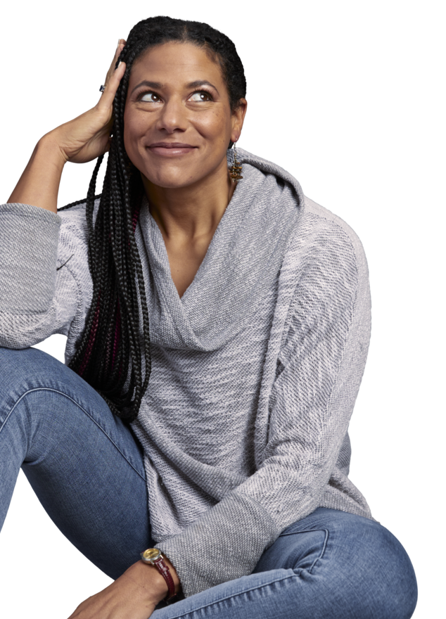 athletic tan woman smiling sitting 