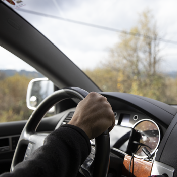 man driving car.