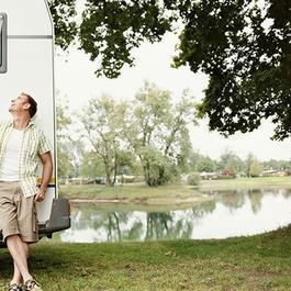 father and son with motorhome