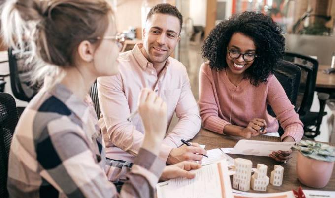 three people in meeting