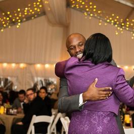 Groom dancing with mom at wedding