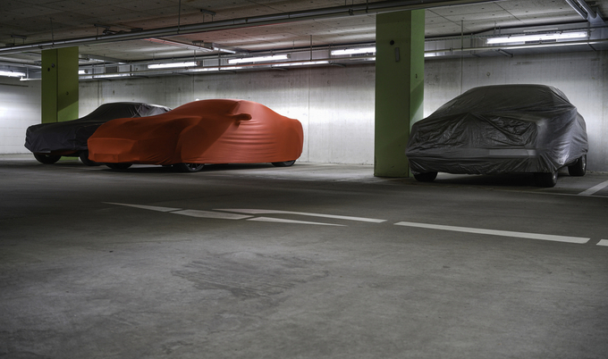 Covered cars in underground car park