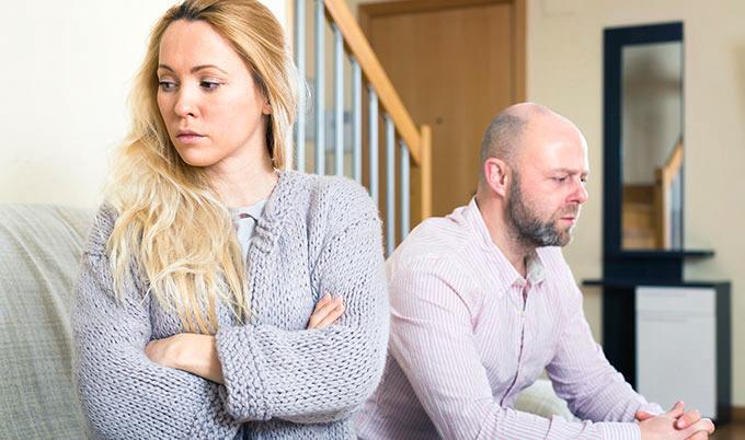 woman facing away from man