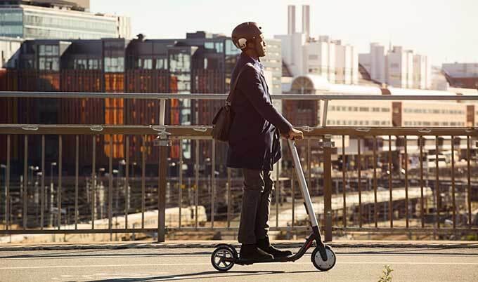 Man riding electric scooter