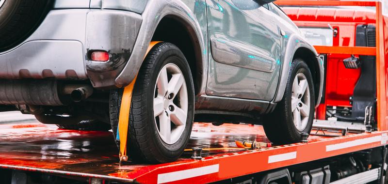 Car being towed on a tow truck