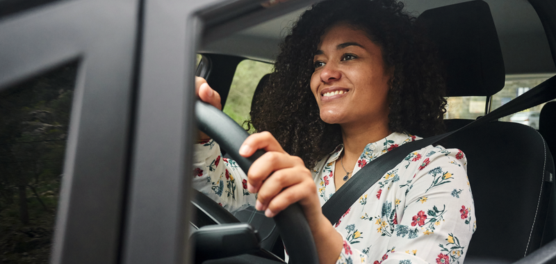 woman driving in car