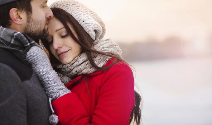 Couple in the winter outside.