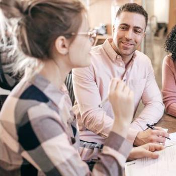 three people in meeting