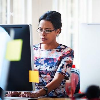 woman sitting at office desk