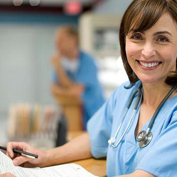 nurse smiling in hospital