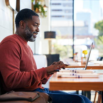 Man working on his laptop.